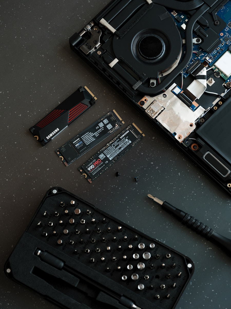 A broken laptop computer sitting on top of a table